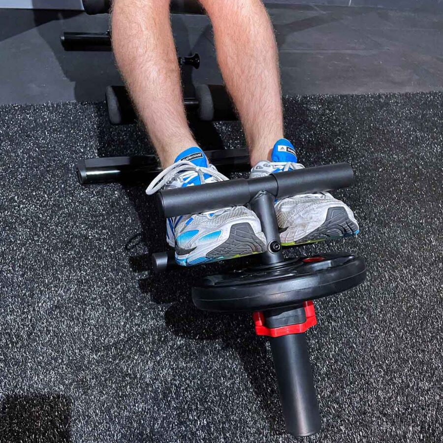 Mans feet using Tibialis Bar and weight plate