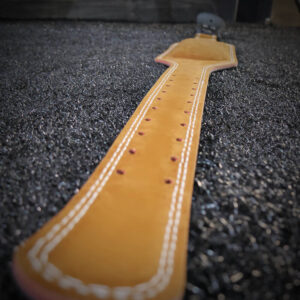 Outstretched belt showing the internal brown PU leather material