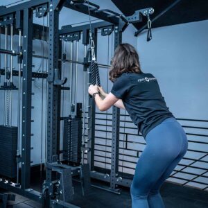 Tricep Rope Being Used on Multigym Rack